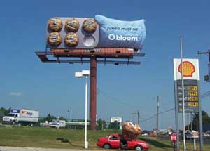 Muffin Billboard Crushes Car